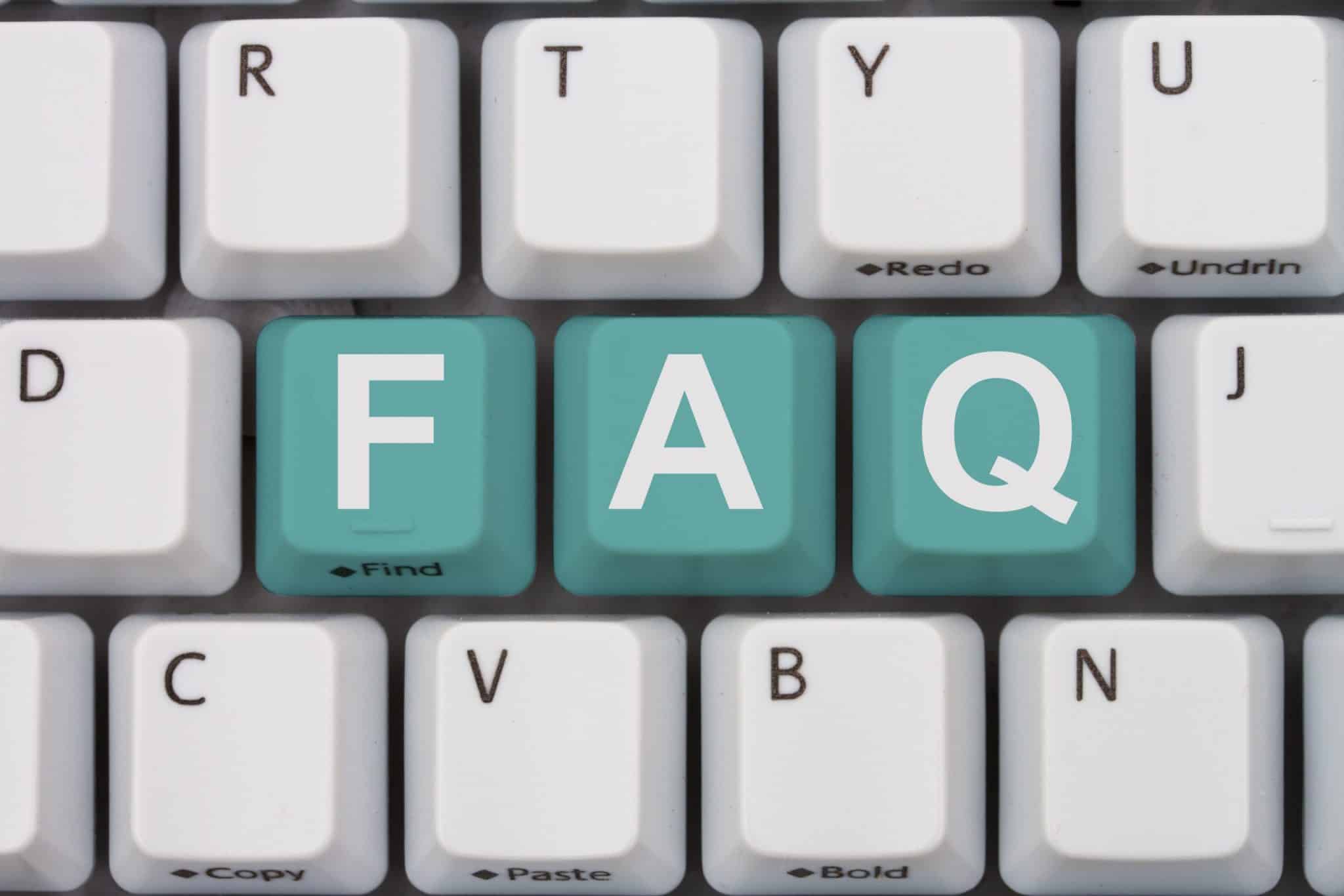 FAQ green keys on a white computer keyboard