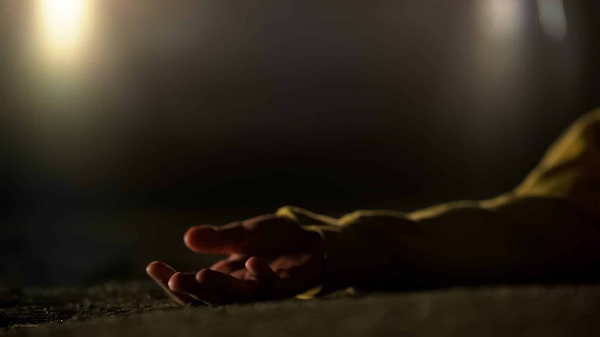 dead body laying on the street