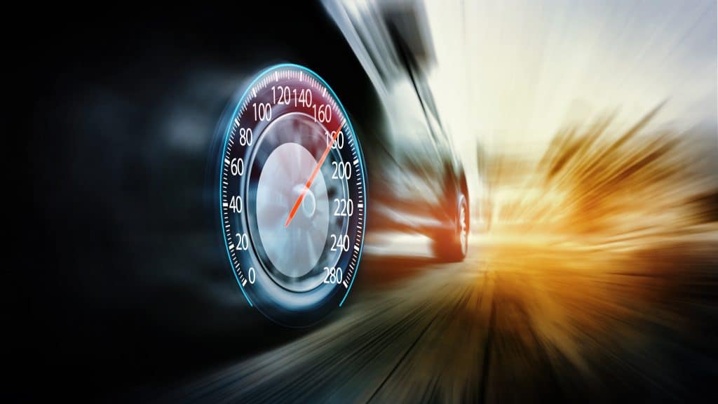 Illustration of a speeding car with a speedometer marked at 120 mph